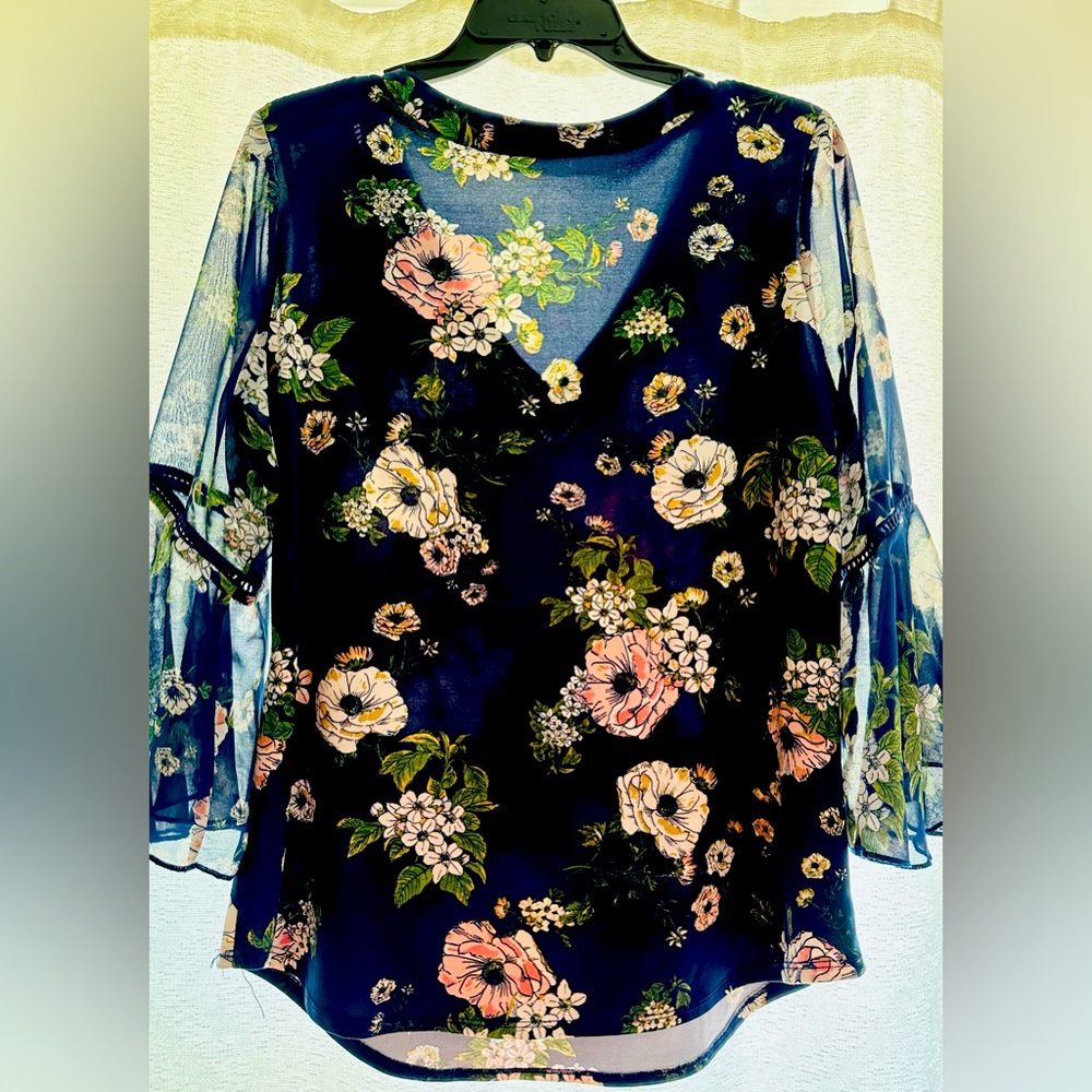 Blue floral maternity blouse.